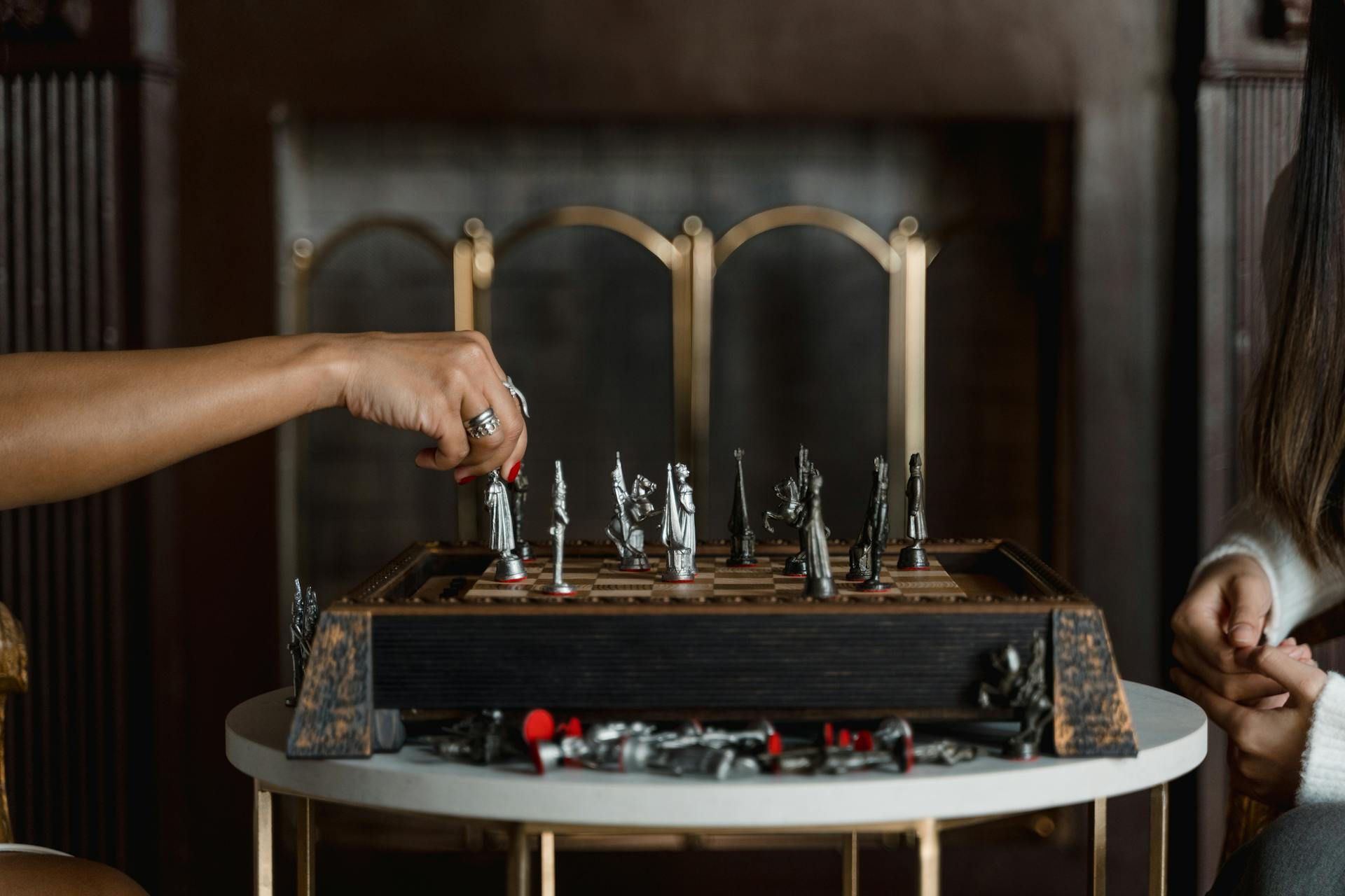 two African finance professionals are engaging in a game of chess which is a recreational hobby for finance professionals.